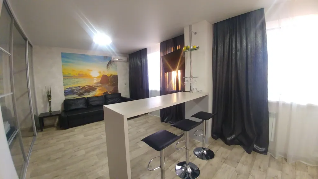 Квартира-студия с дизайнерским ремонтом с шикарным видом на город