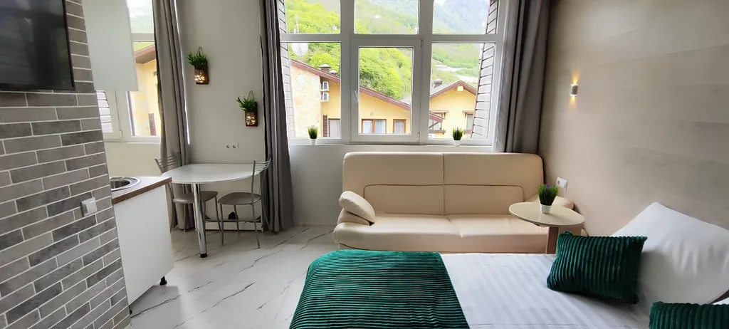 Стильная студия с лучшим видом на горы