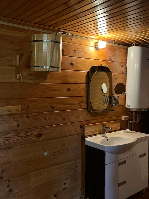 Уютный дом-баня из клеёного бруса, с двумя бассейнами