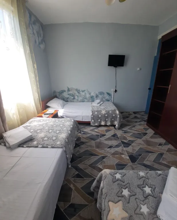 Трёхместный номер с тремя кроватями