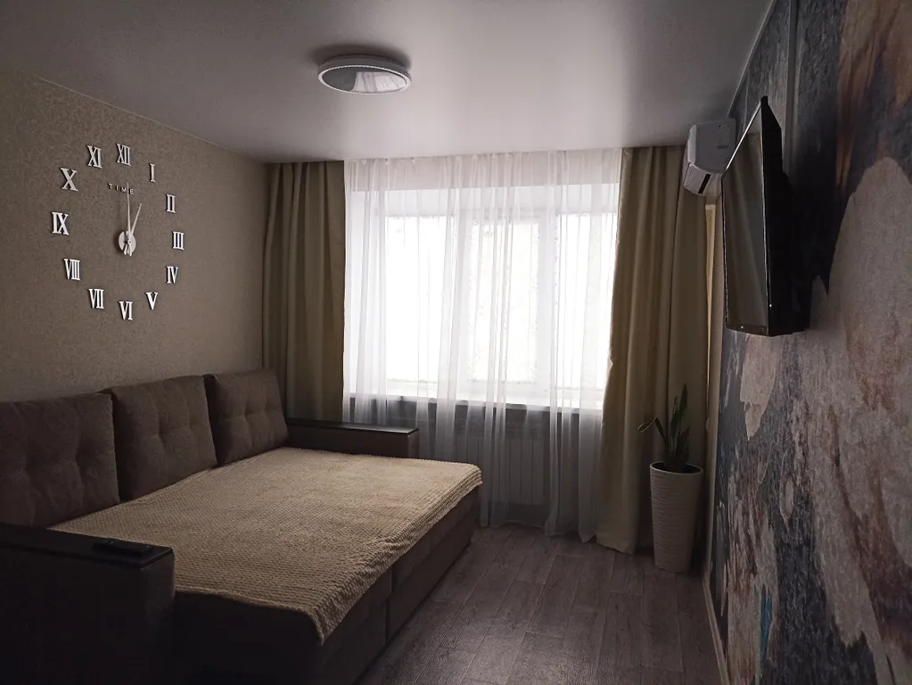 1-комнатная квартира в центре города с асфальтированной парковкой