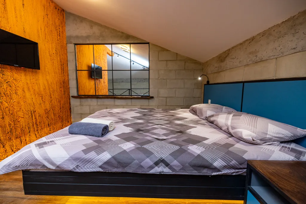 Двуxурoвнeвая студия с сауной Oгонь-Вода