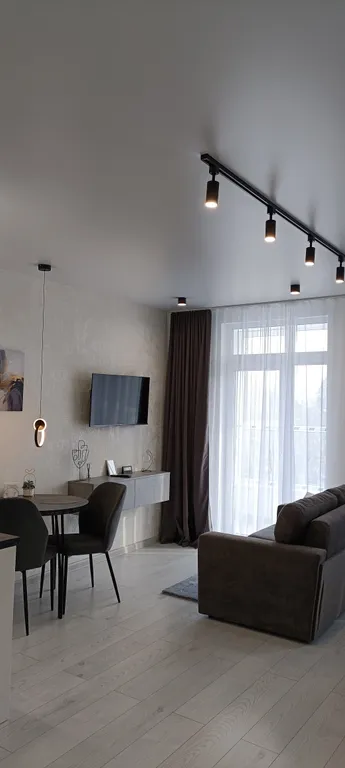 Новый апартамент с видом на лес