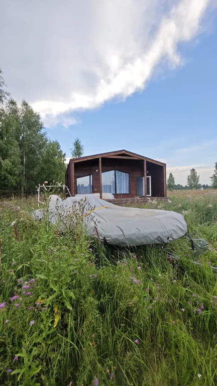 Дом у реки на закрытой охраняемой территории комплекса Гранд Ольгино