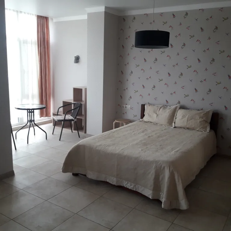 Светлые апартаменты в Солотче