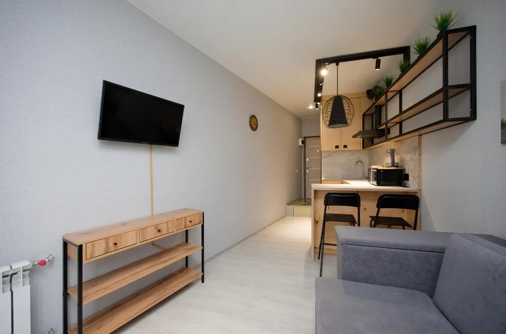 Уютная студия с панорамным окном