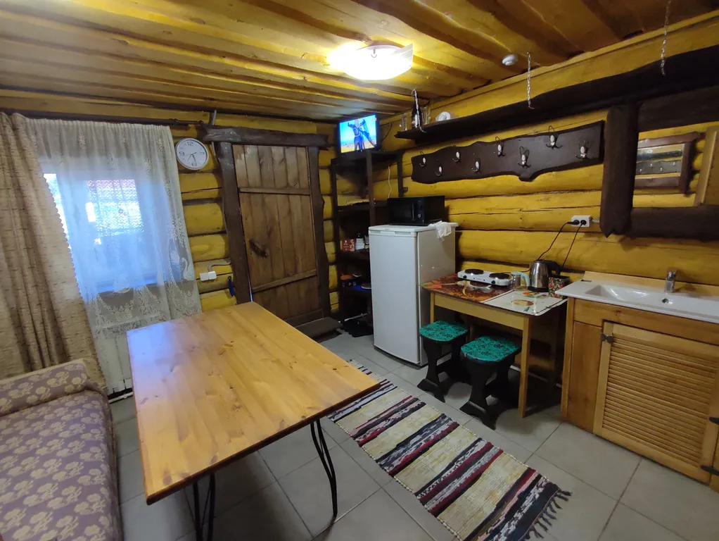 Бревенчатый 2-комнатный эко дом с большой верандой