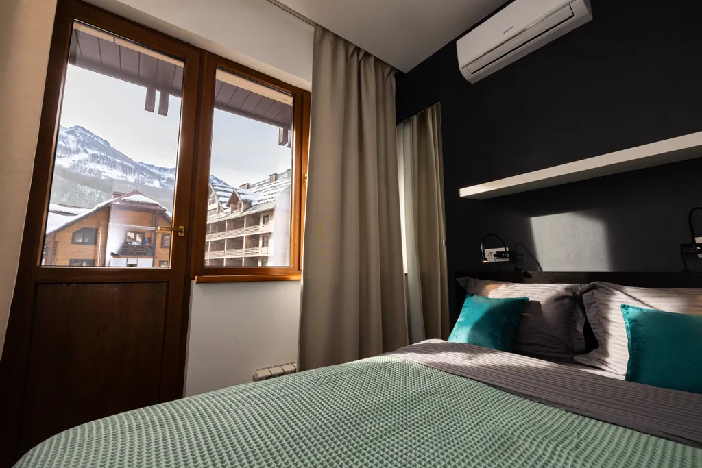 Современные дизайнерские апартаменты с потрясающим видом на горы