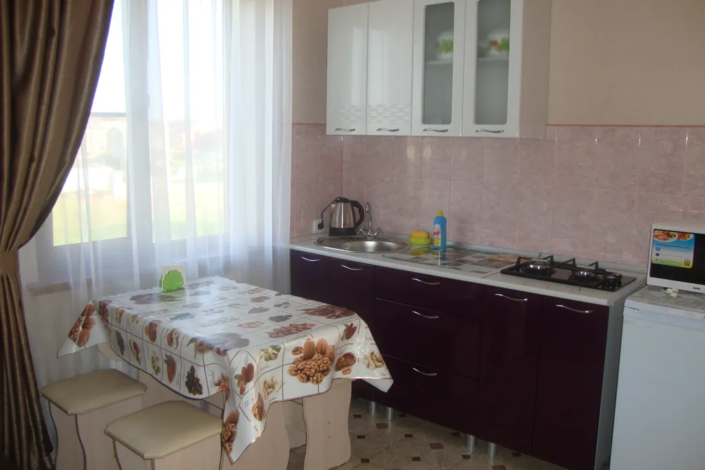 Квартира Двухкомнатные апартаменты с кухней — аренда посуточно в Голубицкая