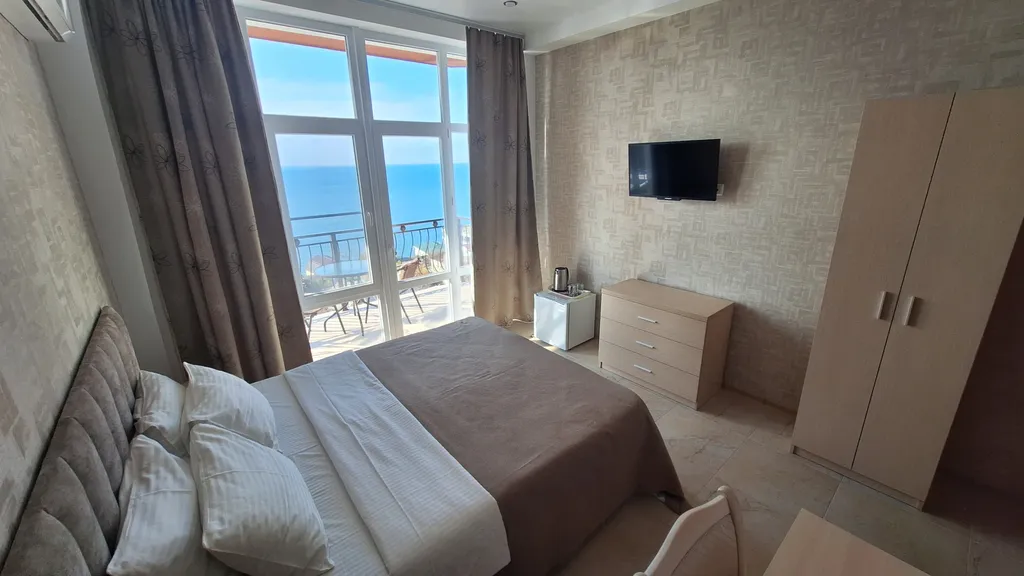 Люкс с балконом и панорамным видом на море