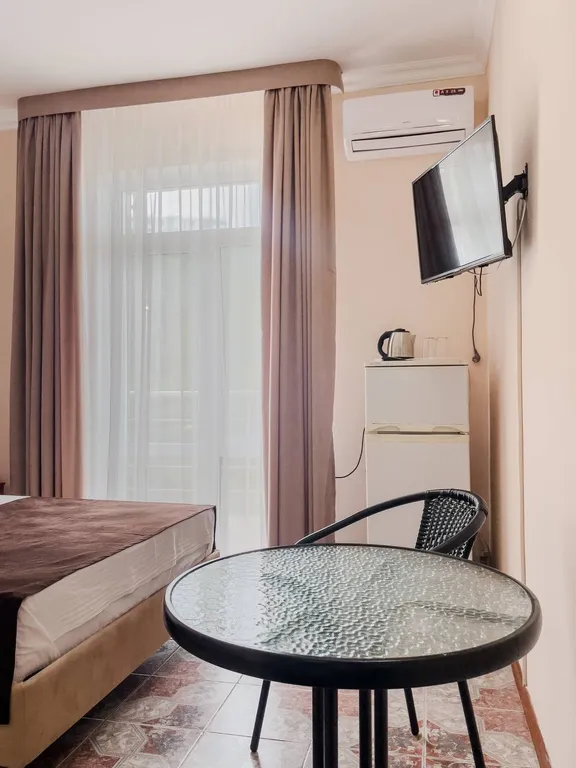 Трехместный номер с балконом