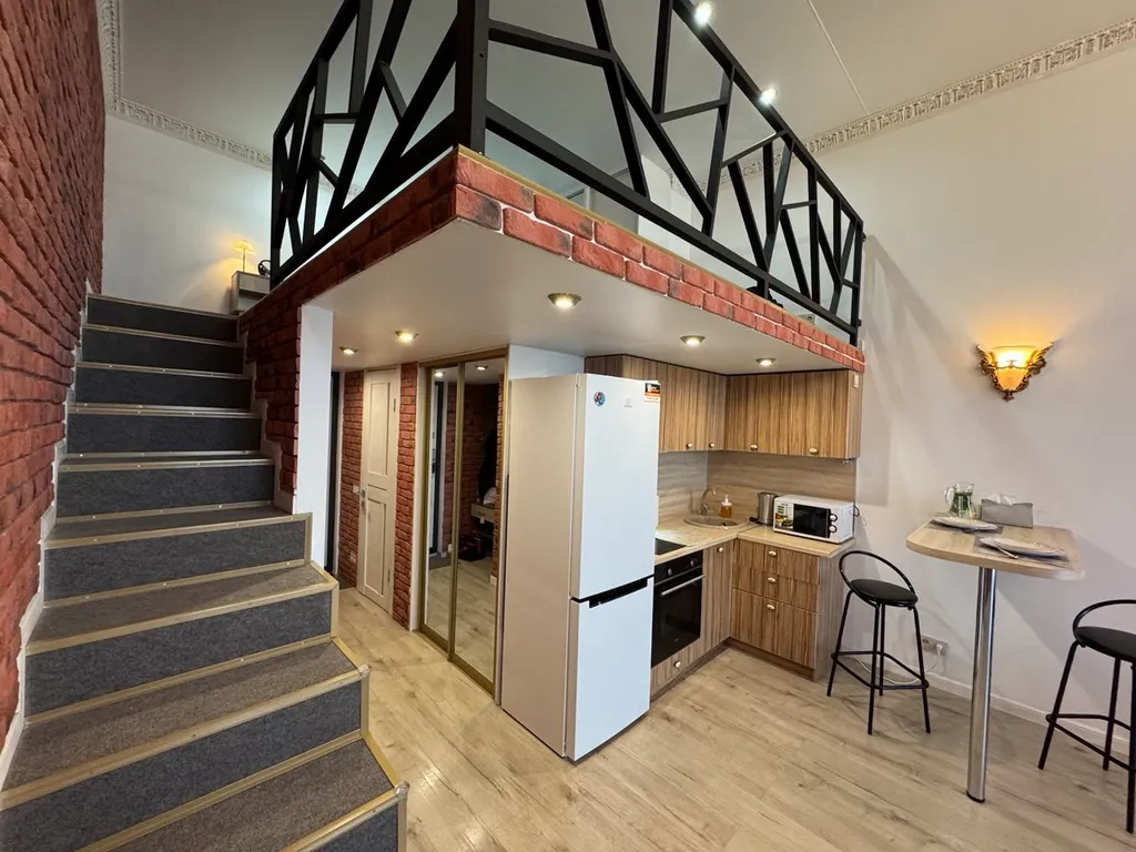 Двухуровневая стильная и комфортабельная квартира