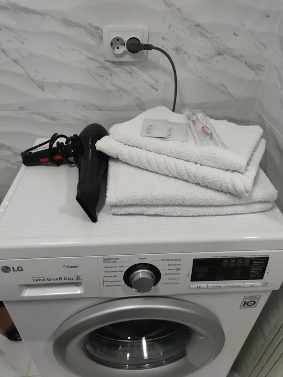 Уютная квартира напротив Алматы Арены