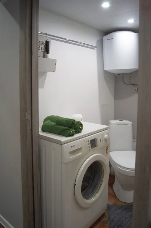 Двухуровневая студия с высокими потолками