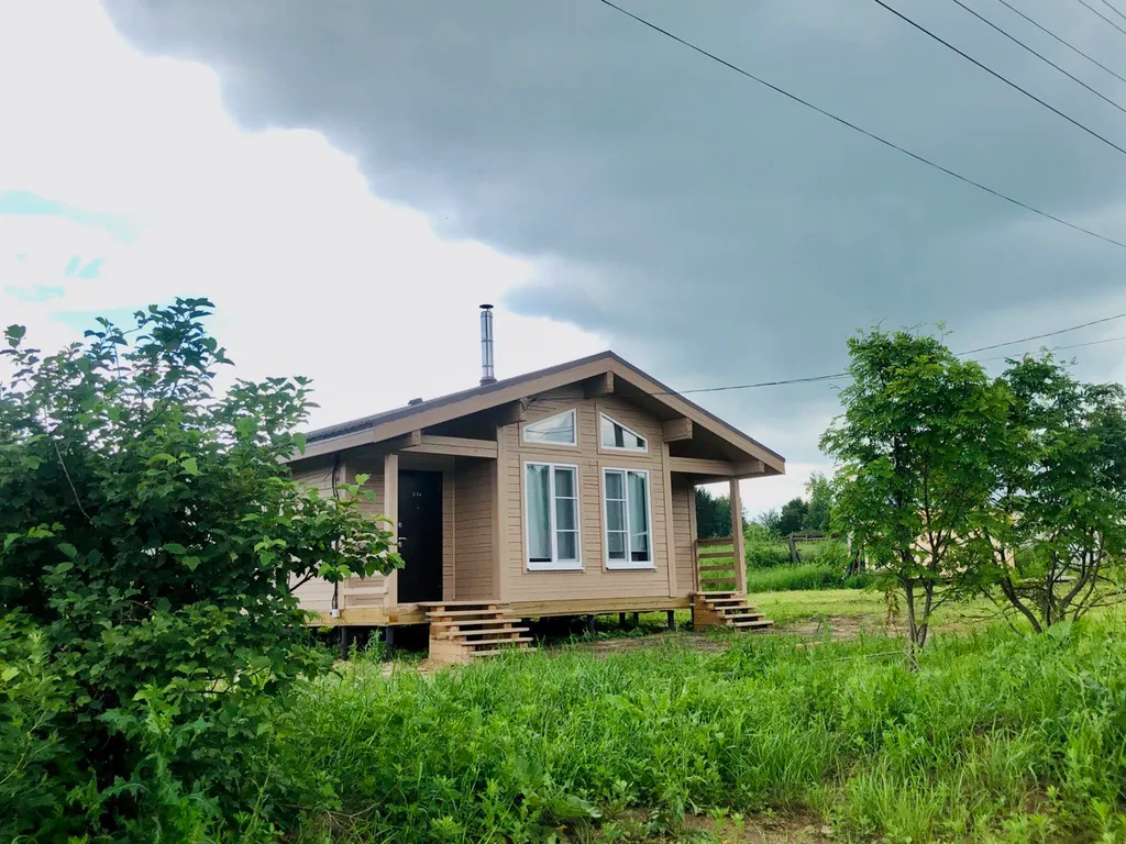 Уютный деревянный загородный дом в живописном селе