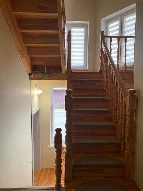 Трёхэтажный дом на берегу Волги