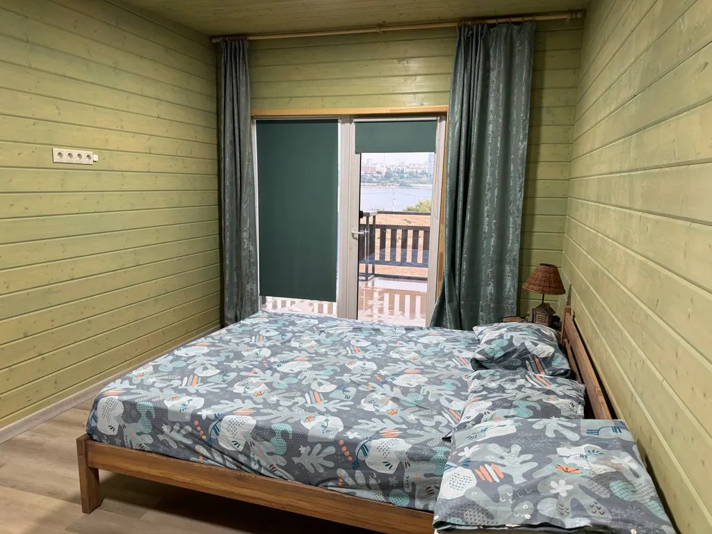 Новый дом с шикарным видом на центр города, через реку Волга