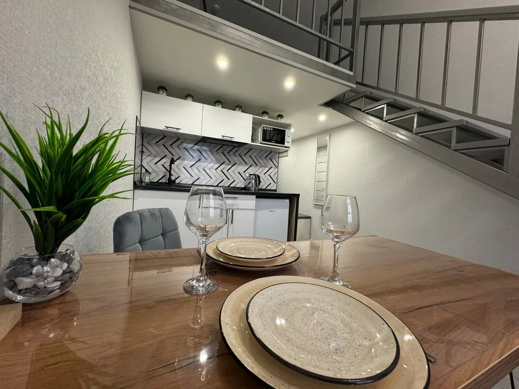 Стильная студия двухуровневая в центре города