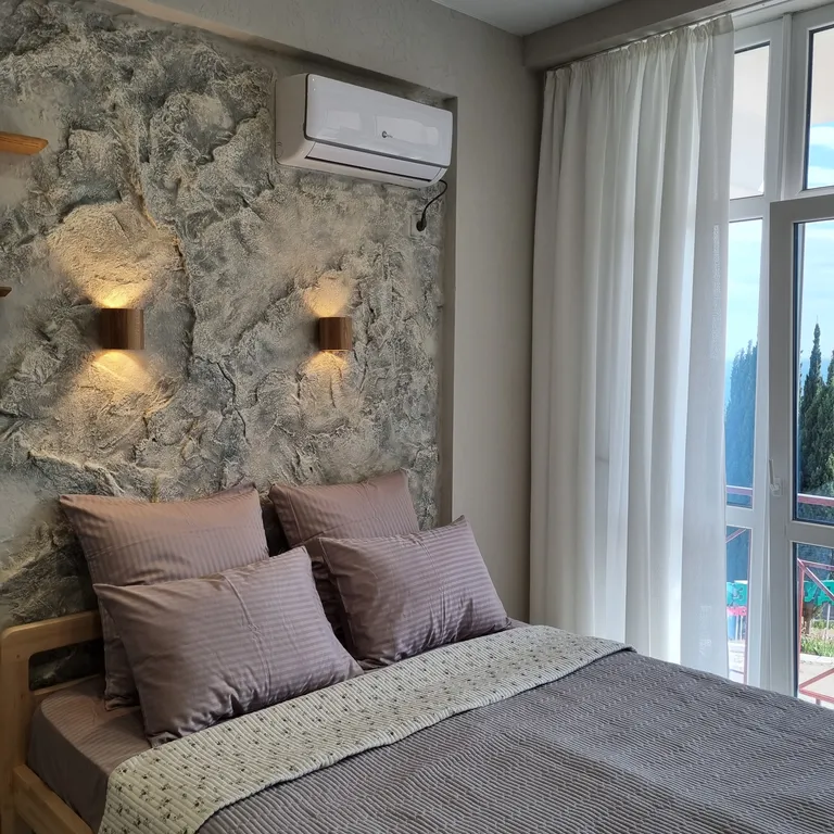 Студия в Ласпи с видом на море