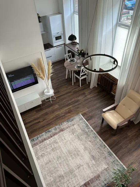 Эксклюзивная двухуровневая 1-комн. квартира с дизайнерским ремонтом