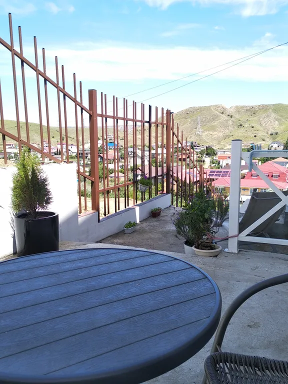 Студия с видом на горы и террасой