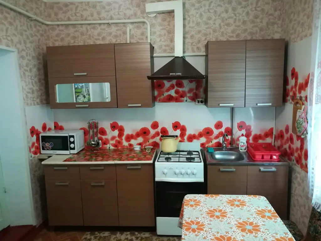 Утопающий в зелени уютный дом