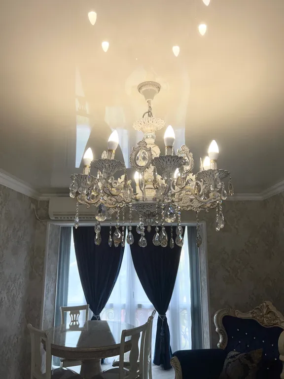 Апартамент с видом на море и на колесо обозрения