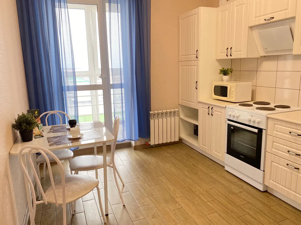 Уютная квартира с ортопедическим матрасом и панорамным балконом