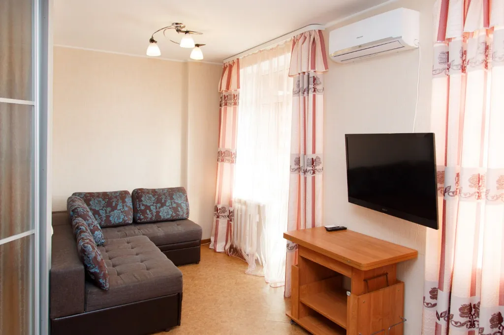 Уютная квартира с детской площадкой во дворе