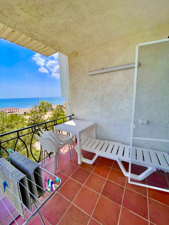 Апартаменты на первой линии с открытым балконом и видом на пляж