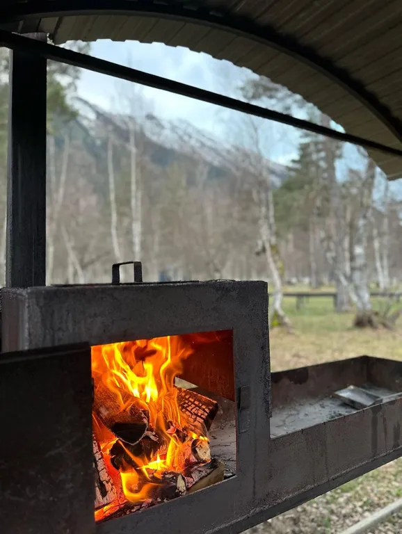 Коттедж Атмосферный домик с мангалом в горах — Архыз