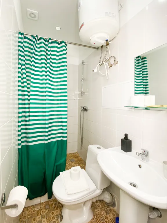 Уютные апартаменты-студио Солнечный Питер на Гончарной улице