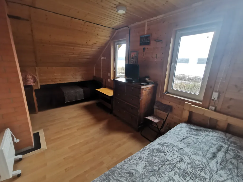 Дом на берегу залива Онежского озера в Республике Карелия