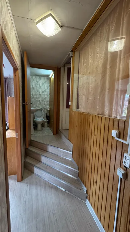 Дом-квартира с мансардой в центре