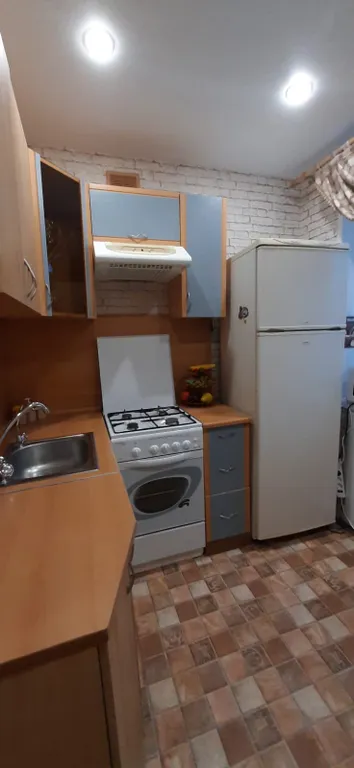 Двушка с видом на ёлочки.