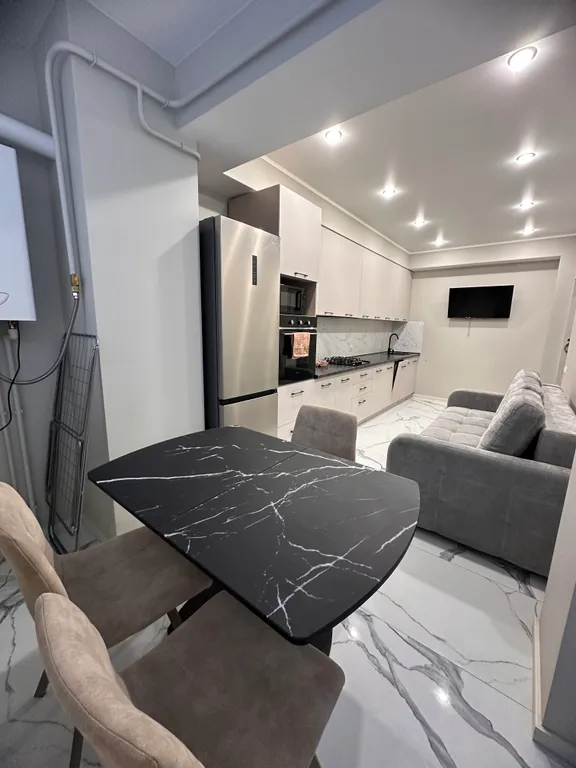 Уютная квартира в центре города с дизайнерским интерьером