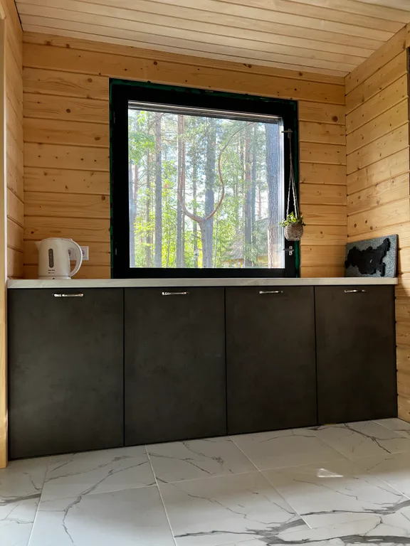 Стильный дом на берегу Ладожского озера с панорамным видом