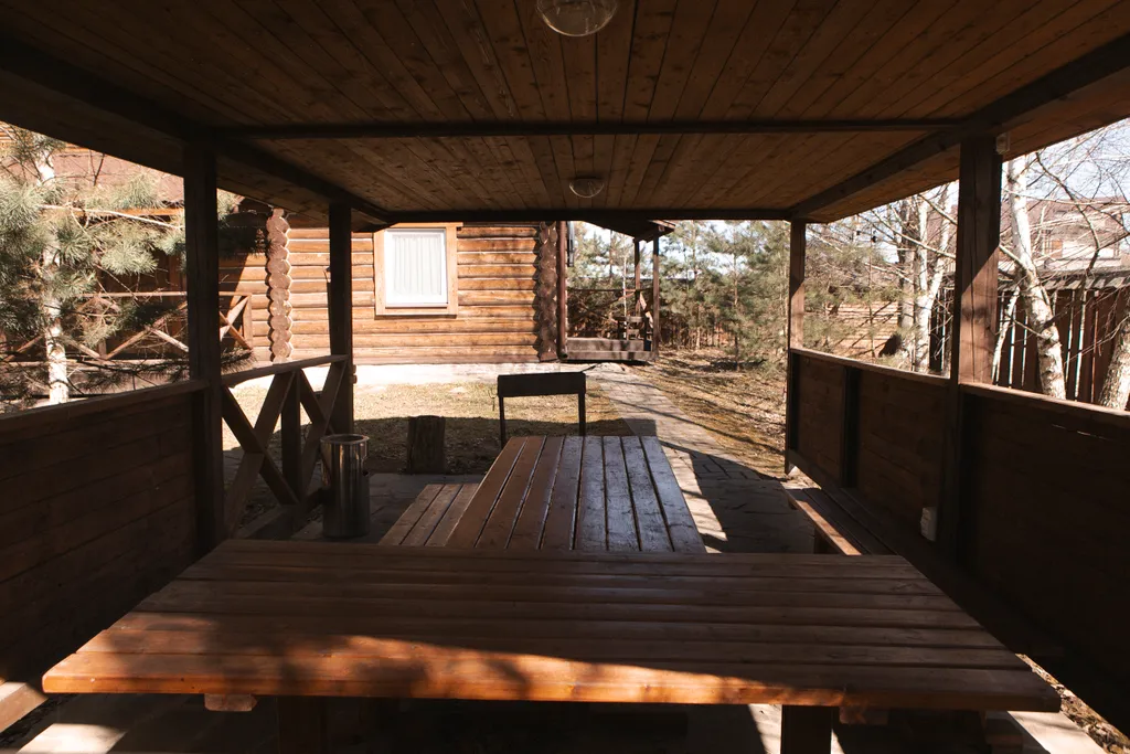 Двухэтажный дом для отдыха на природе с баней