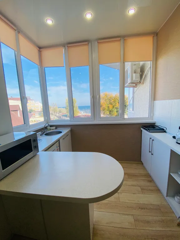 Студия с видом на море