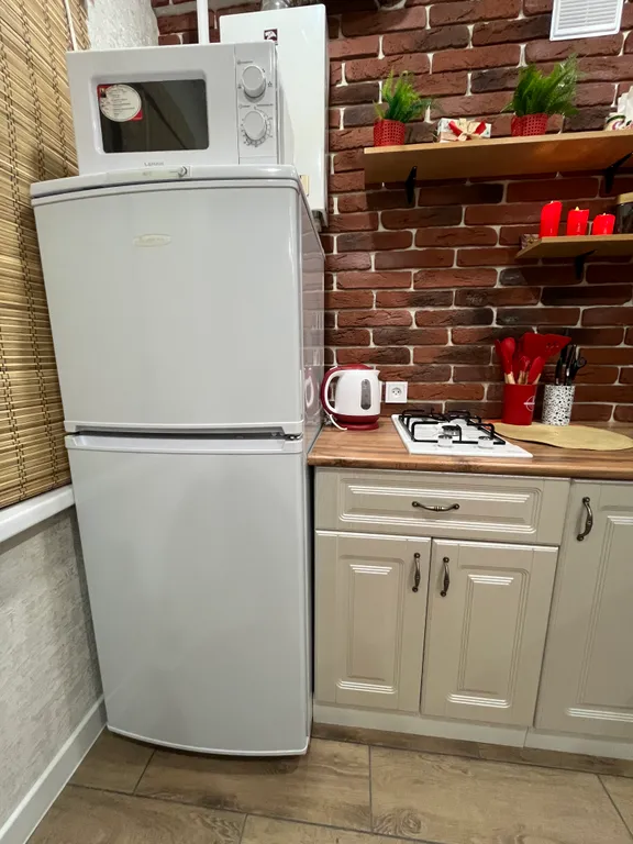 Студия в центре с дизайнерским ремонтом и балконом Город в городе