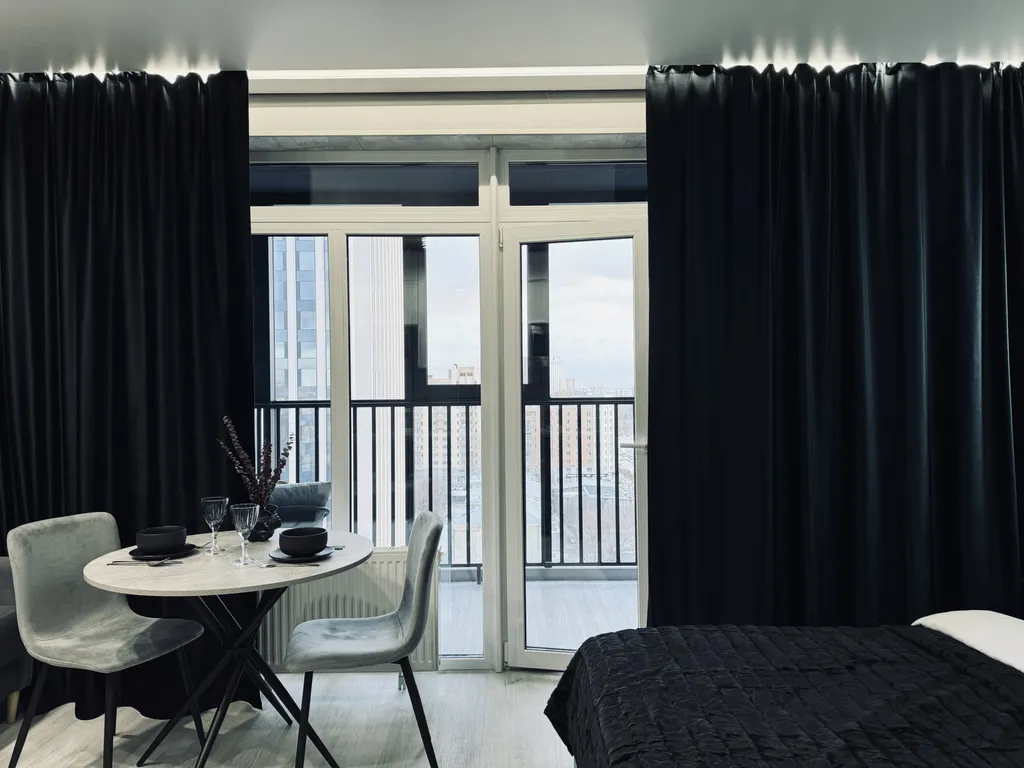 Изящная студия с шикарным видом на мегаполис