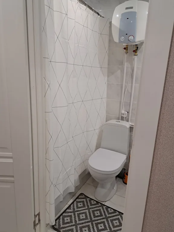 Стильная и уютная двухъярусная студия