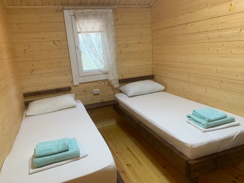 Индивидуальный трехкомнатный эко-дом с террасой и кухней Ветер Перемен