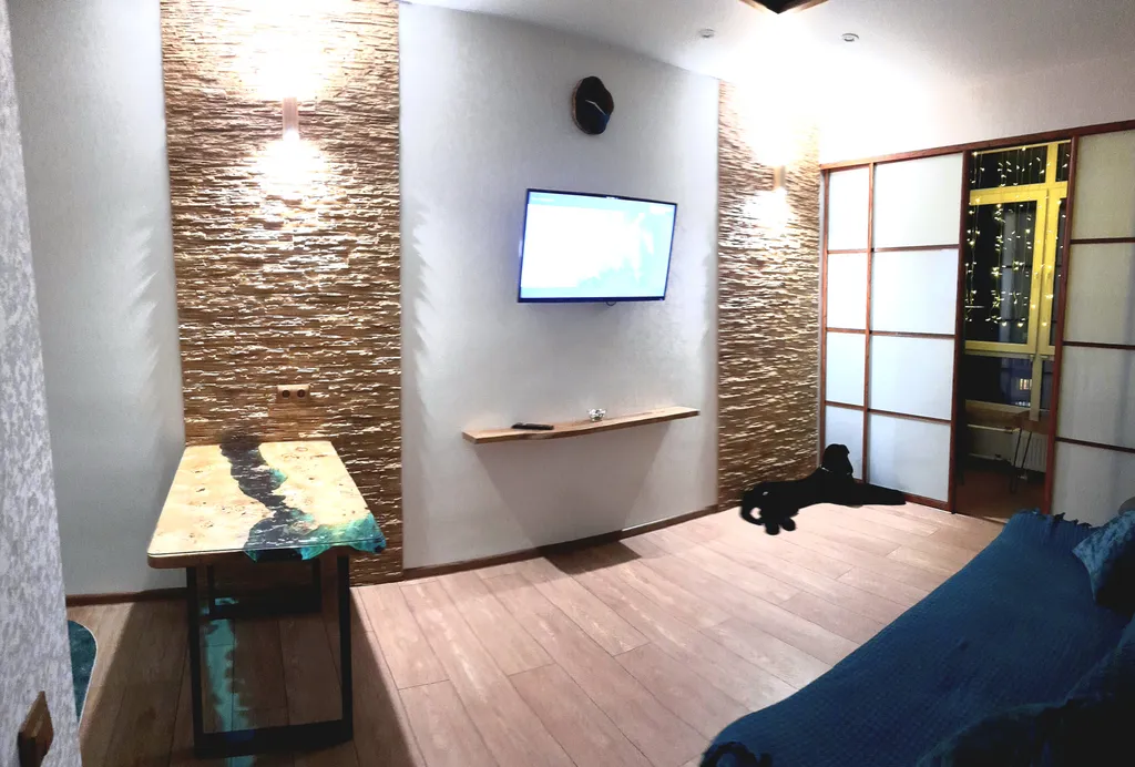 Апартамент с лаундж-зоной в экодизайне в центре города