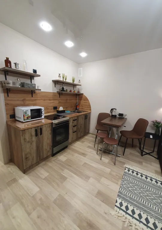 Современная студия с красивыми закатами в самом центре города