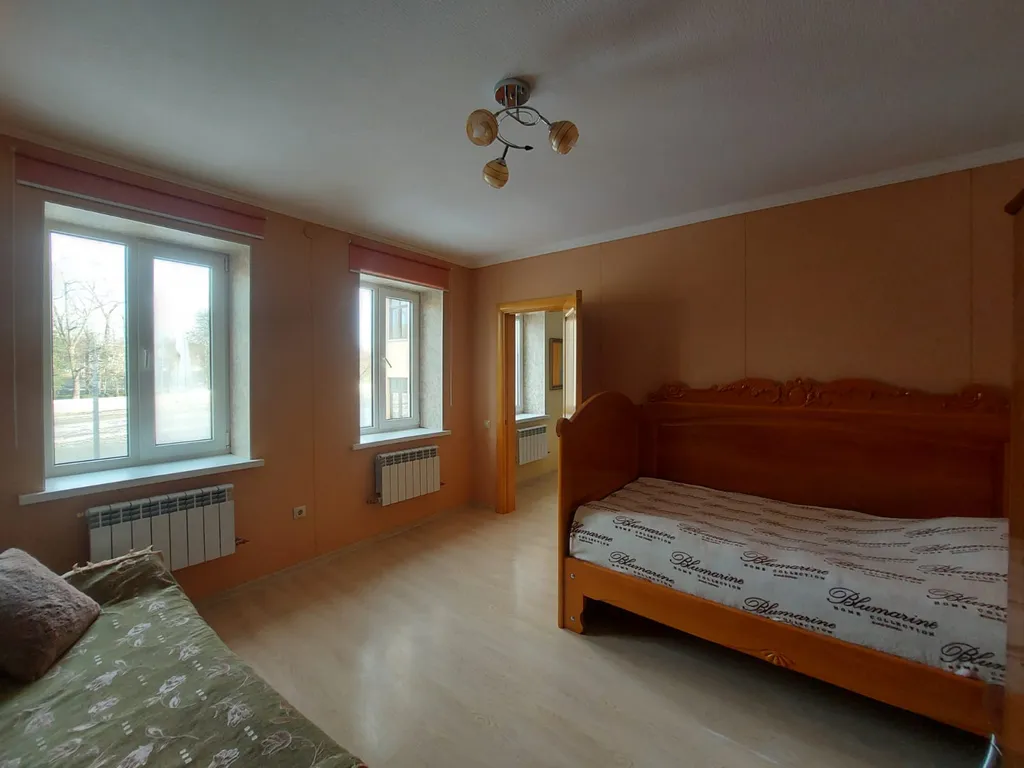 Дом в центре города на набережной реки Терек