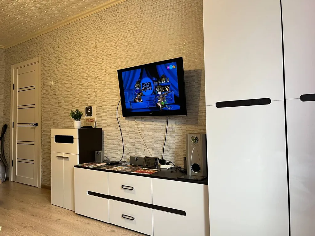 Уютная квартира с видом на склон