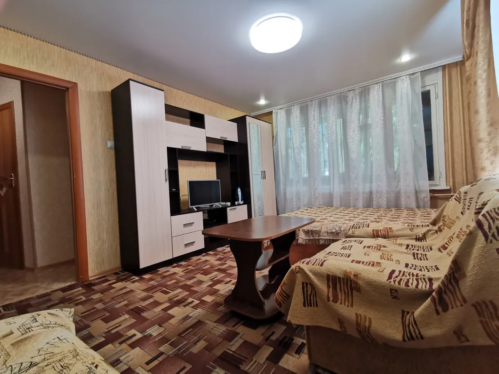 Уютная квартира На Жуковского