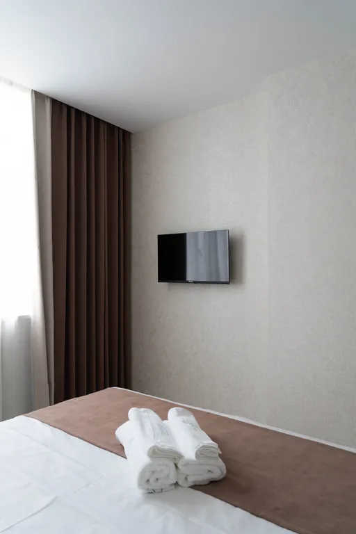 Уютный номер с 2 спальнями и баром, с видом во двор