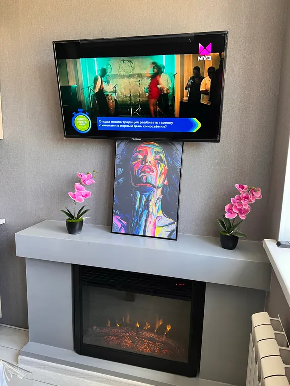 Квартира с необычной планировкой, камином и кондиционером